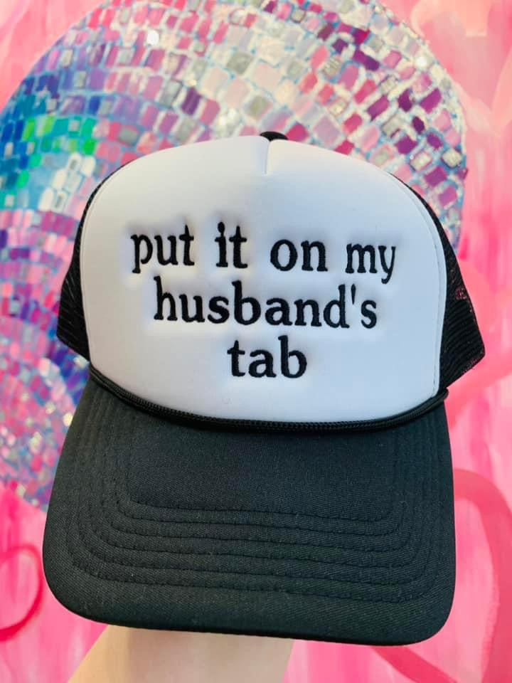 Put it on my husbands tab Trucker Hat